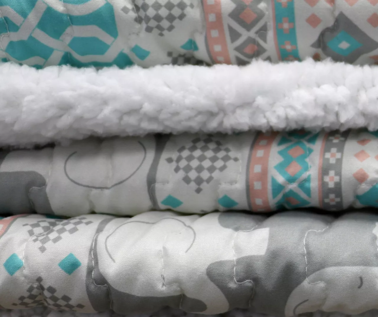 Turquoise & Pink Elephant Stripe Quilted Sherpa Throw, (50" X 60") 9 Turquoise & Pink Elephant Stripe Quilted Sherpa Throw, (50" X 60") - Image 7